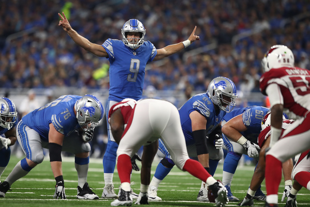 Stafford's 4 TD lift Lions to 35-23 win over Cardinals