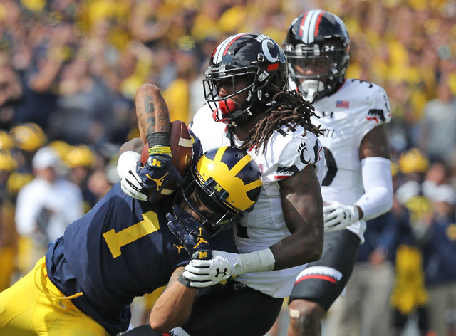 No. 8 Michigan looks sluggish in 36-14 win over Cincinnati