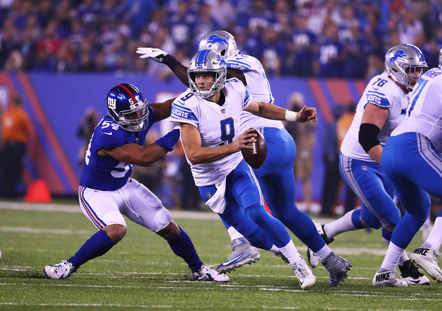 Stafford throws for 2 TDs as Lions beat Beckham, Giants