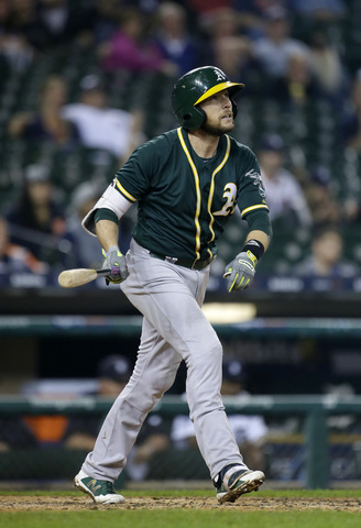 Lowrie's slam helps A's rally from 4 down, beat Tigers 9-8