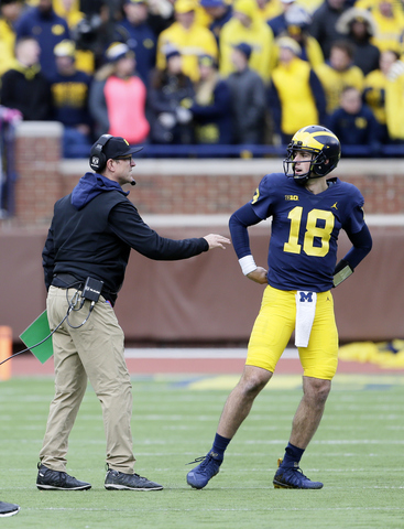 Michigan likely to start QB Peters against Minnesota