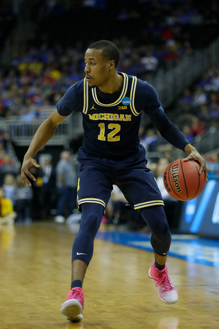 Abdur-Rahkman scores 17 in Michigan's 72-65 win over Chips