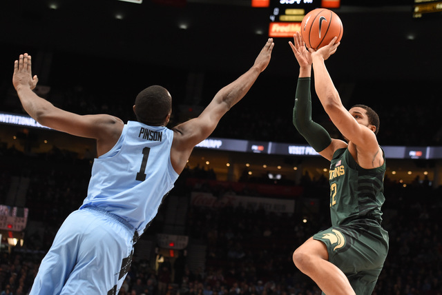 No. 9 Michigan State thumps No. 4 North Carolina 63-45