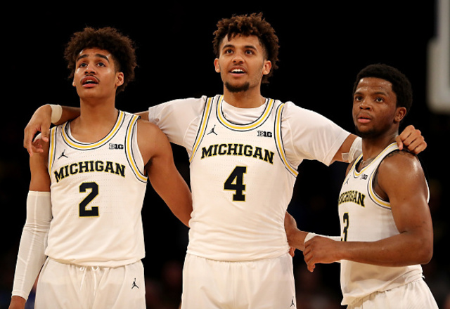 No. 15 Michigan overcomes Iowa in OT 77-71 in Big Ten