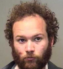 Lansing man accused of assault, carjacking