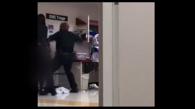 The Latest: Chief disturbed by video of cop hitting woman