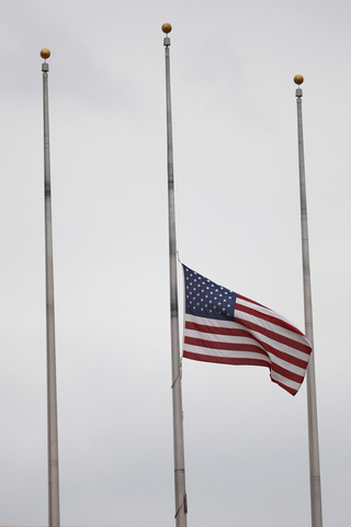 Gov. Rick Snyder lowers flags for Patriot Day